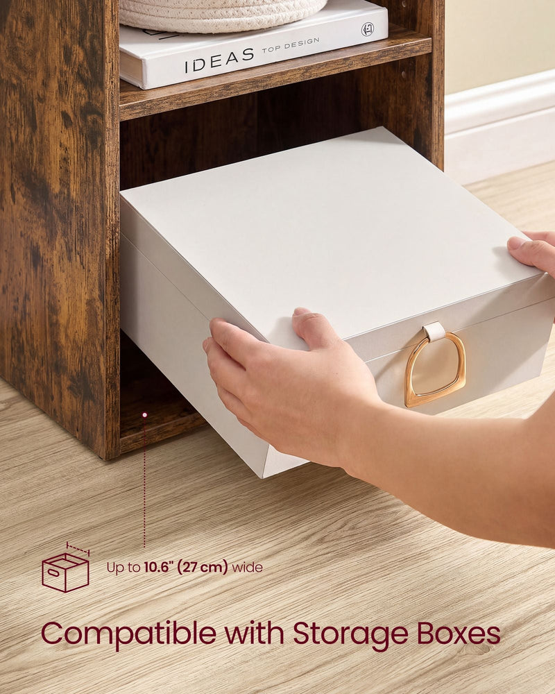Storage box up to 27 cm wide being slotted onto a shelf of the bookcase