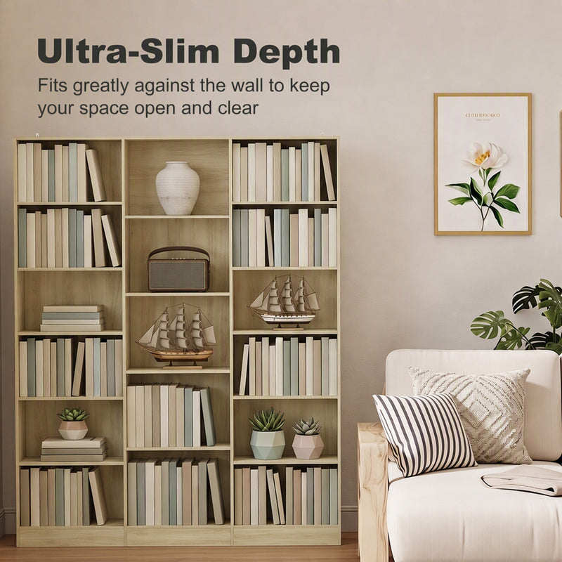Ultra-slim depth bookcase fitted against a wall beside a sofa