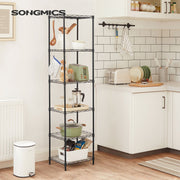 Lifestyle photo of the shelving unit holding kitchen items such as a toaster, jars and cookware, with the Songmics logo