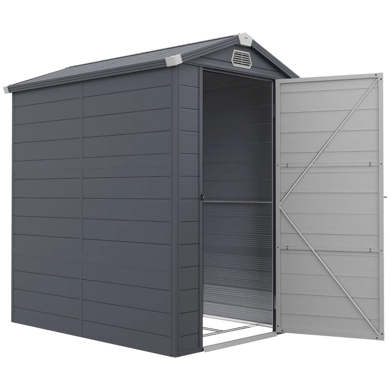 Image of a 4 x 6 foot plastic garden shed with an apex roof and a white door