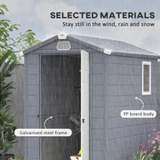 Image of a 4 x 6 foot plastic garden shed with an apex roof and a white door