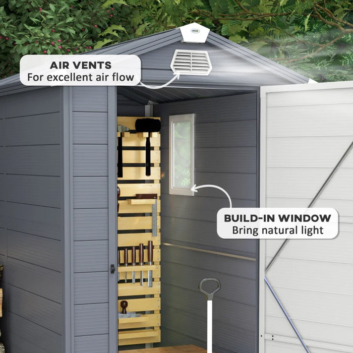 Image of a 4 x 6 foot plastic garden shed with an apex roof and a white door