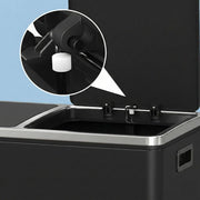 Close-up of the soft-close hinge mechanism inside an open lid