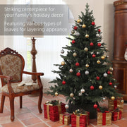6ft spruce Christmas tree decorated with red, gold and silver baubles beside an armchair