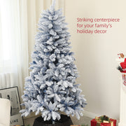 Flocked tree in a lounge with a striking centrepiece caption