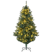 Lit green Christmas tree with warm white LEDs on a black steel base, white background