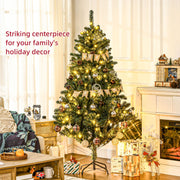 Decorated tree with warm white lights in a living room under the text Striking centrepiece