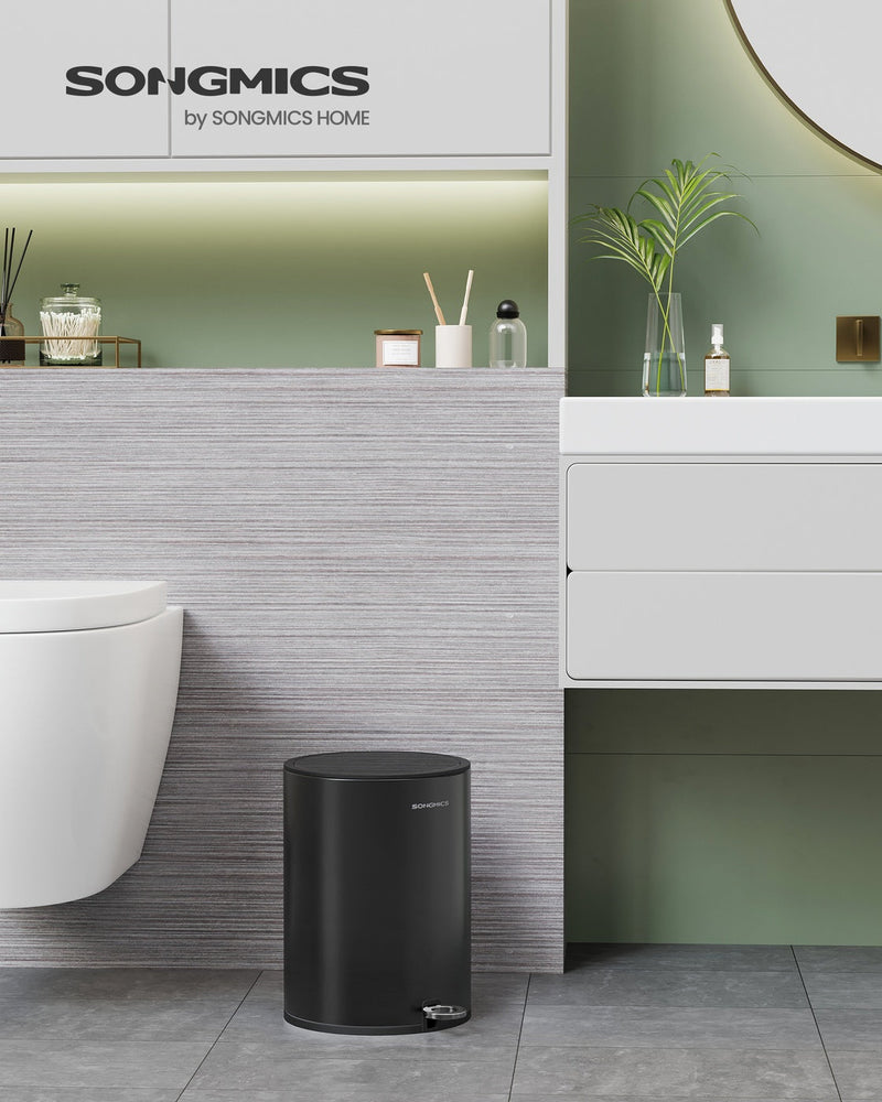 Close-up of the soft-close lid on the ink black bathroom bin