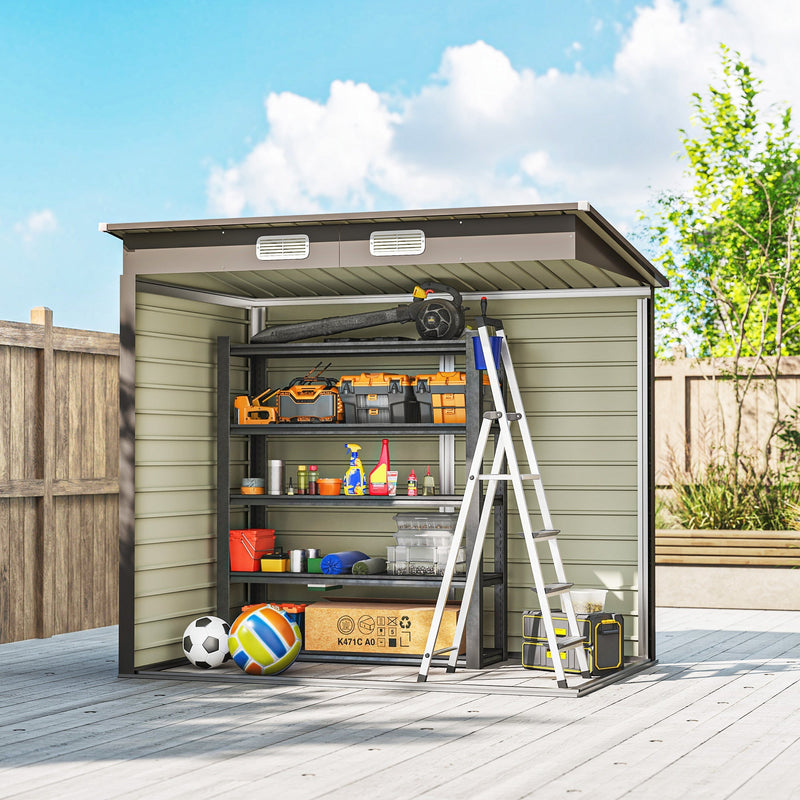 Front view of the open 6x4ft metal shed holding a stepladder, leaf blower and tool boxes on shelves