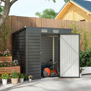 Grey metal garden shed in a garden with the door open and a lawnmower stored inside