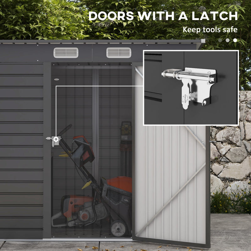 Shed door open showing the metal latch and hasp, with a close-up inset of the fitting