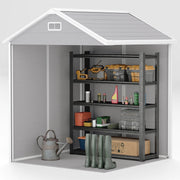 View inside the shed showing the apex roof, gable vent and shelving against the wall