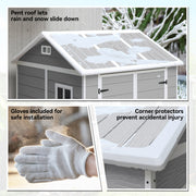 Snow sitting on the shed's pitched roof, showing how rain and snow run off the panels