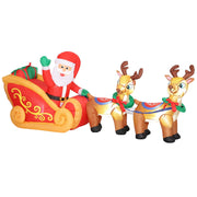 Inflatable Santa in a sleigh pulled by two reindeer on a white background