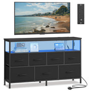 Ink black 7 drawer chest of drawers with blue LED lights, a TV on top and a power socket detail