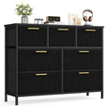 Black 7-drawer corduroy chest of drawers with gold handles on a white background