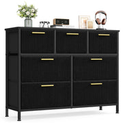 Black 7-drawer corduroy chest of drawers with gold handles on a white background
