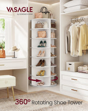 Rotating shoe tower in a walk-in wardrobe corner beside hanging clothes