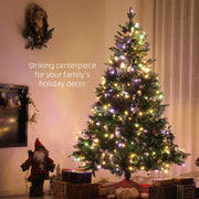 Pre-lit Christmas tree glowing with warm white lights beside presents in a living room