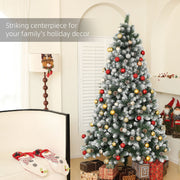 Tree decorated with red and gold baubles in a lounge with presents