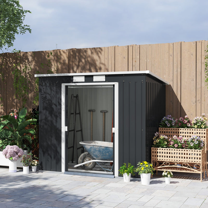 Outsunny 7x4ft pent roof shed on a patio with sliding doors open and a wheelbarrow inside