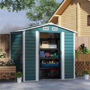 Green 7x4ft metal shed in a garden with its sliding doors open, showing boxes and tools stored inside