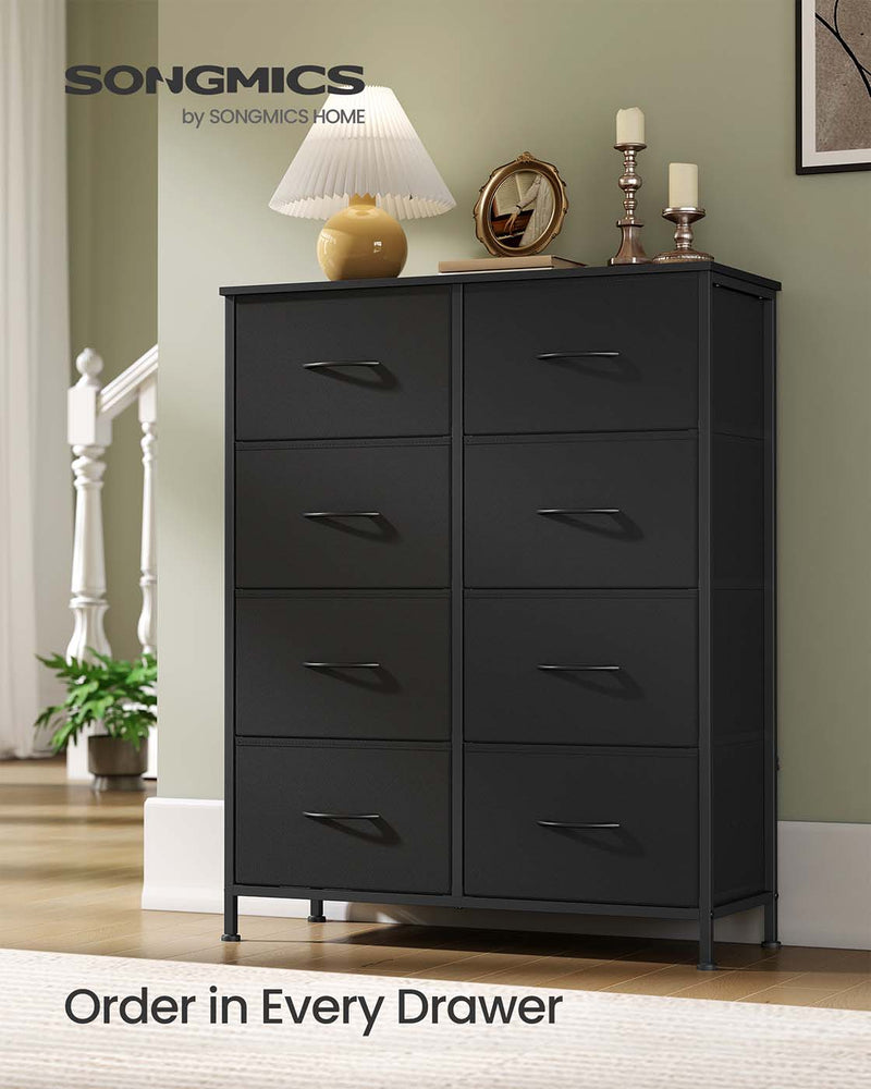 Close-up of a fabric drawer front on the tall chest