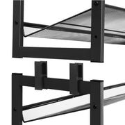 Close up of the angled mesh shelf and the black connectors that clip the two shoe racks together