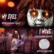 Close-up of the creepy girl's glowing eyes and battery compartment