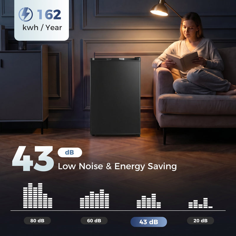 Black mini freezer in a dim living room with 162 kWh per year and 43 dB noise infographic