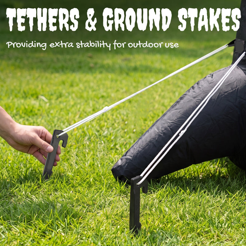 Close-up of the ground stake and tether rope used to anchor the inflatable tree