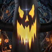 Close-up of the spooky tree's glowing carved face design