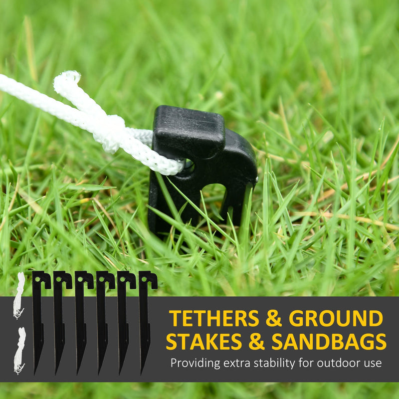 Black ground stake with white guy rope in grass above a row of six stakes