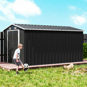Side view of the long dark grey metal shed on a garden deck