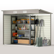 Cutaway view of the shed interior filled with racking, spades, boots and a watering can