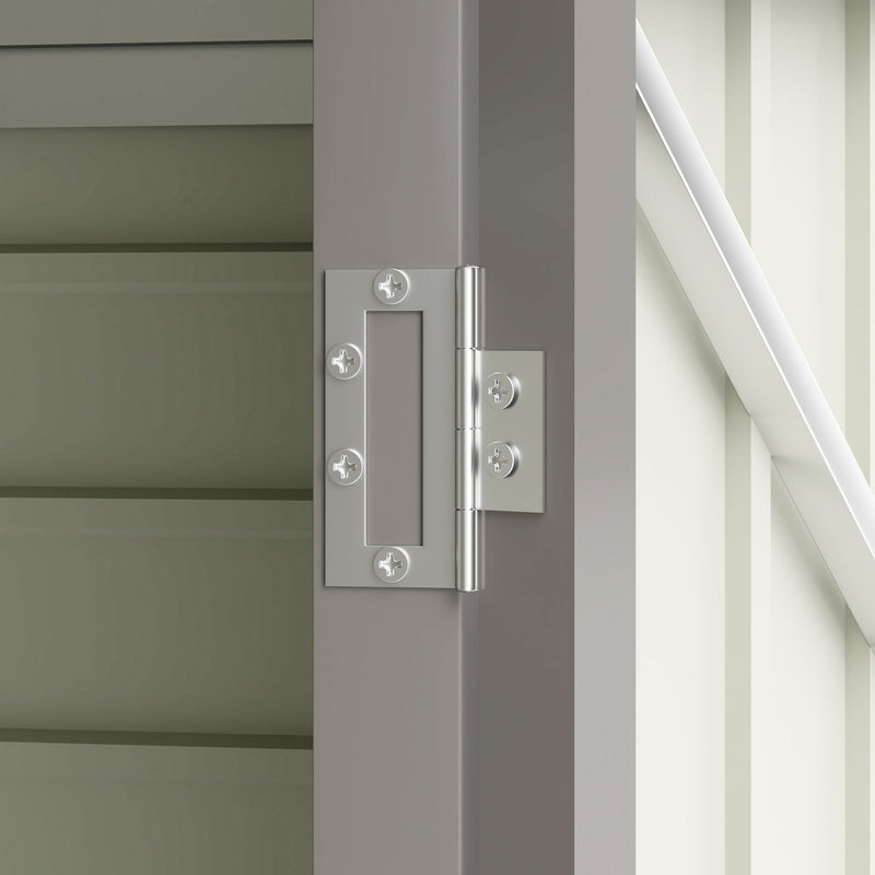 Close-up of a metal door hinge fixed to the shed door frame