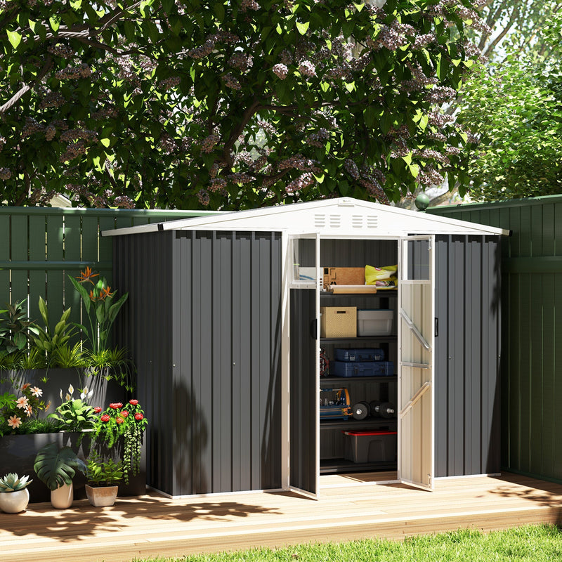 Dark grey shed on decking with the double doors open showing crates and storage boxes