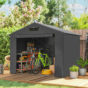 Dark grey portable shed on decking with a bike, shelves and garden tools inside