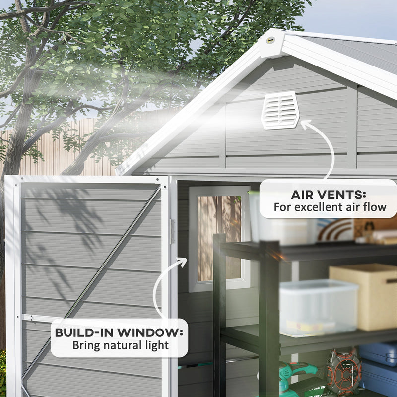 Close-up of the gable air vents and the built-in window that let light and air into the shed