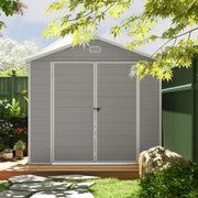 Light grey shed seen head-on with both doors closed and latched, in a planted garden