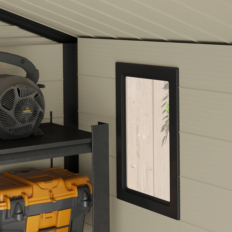 Inside wall of the shed with the window beside a shelf holding a leaf blower and tool box