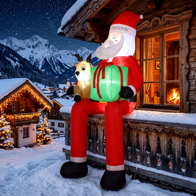 Inflatable Santa on a snowy wooden chalet balcony with mountain views