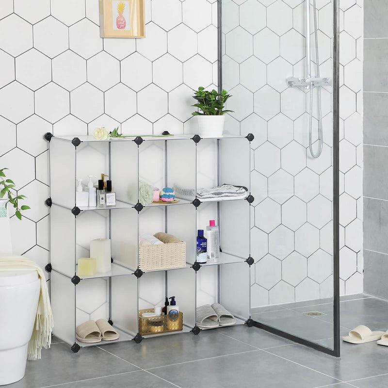 9-cube plastic storage unit built as a 3 by 3 block in a tiled bathroom holding towels and toiletries