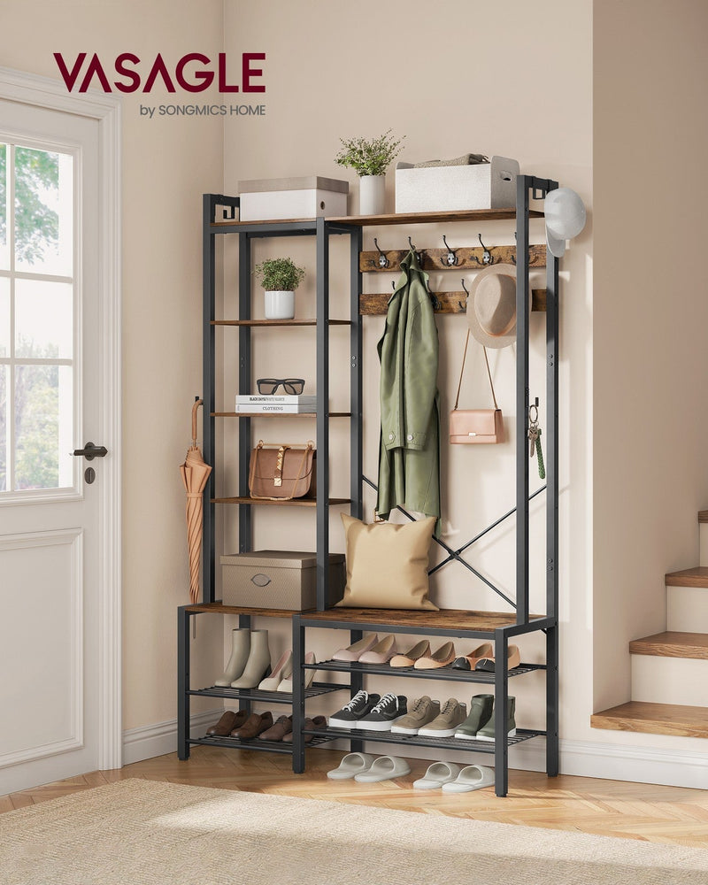 Hall tree styled in an entryway with coats, bags and shoes on the racks