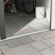 Image of a 9 by 6 foot white metal garden shed with attractive panelling and an apex roof 