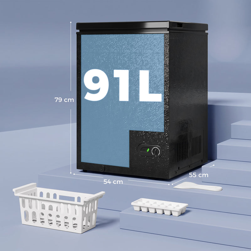 Dimensions diagram of the black chest freezer: 54 cm wide, 55 cm deep, 79 cm high, with removable basket and ice cube tray