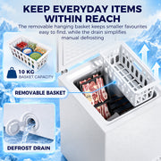 Open white chest freezer showing the removable basket with a 10 kg capacity and the defrost drain