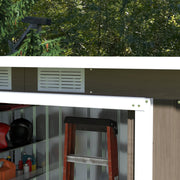 Brown shed with the sliding door open showing a step ladder and shelved bottles inside