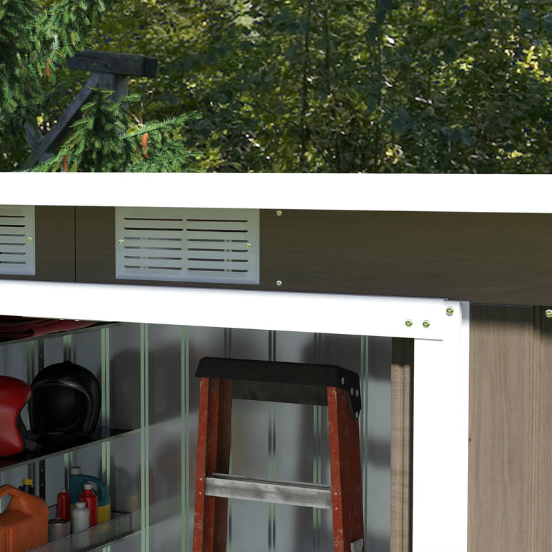 Brown shed with the sliding door open showing a step ladder and shelved bottles inside