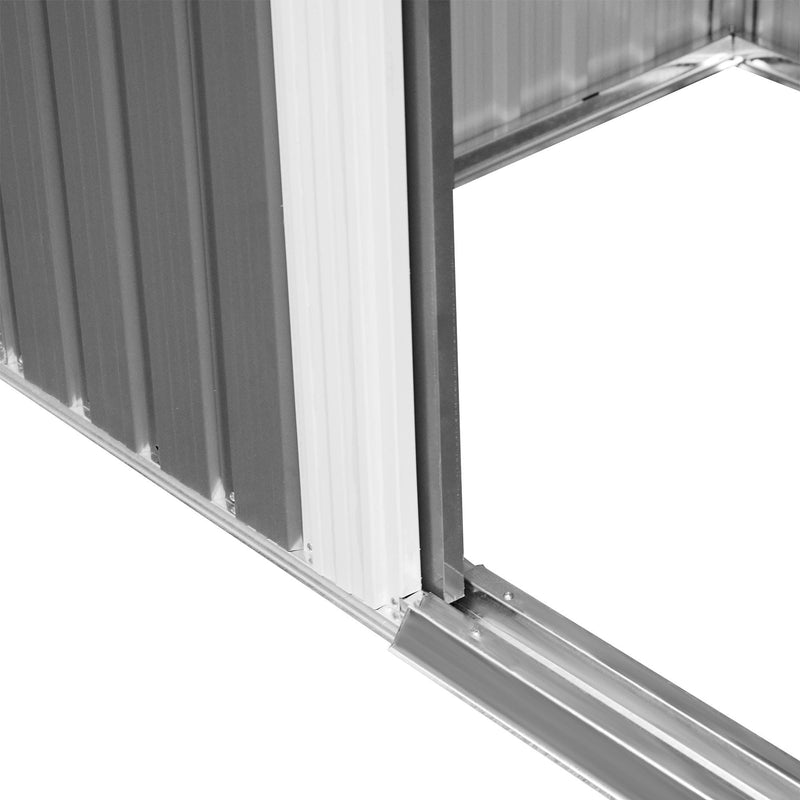 Close-up of the sliding door running in its guide track at the front of the shed